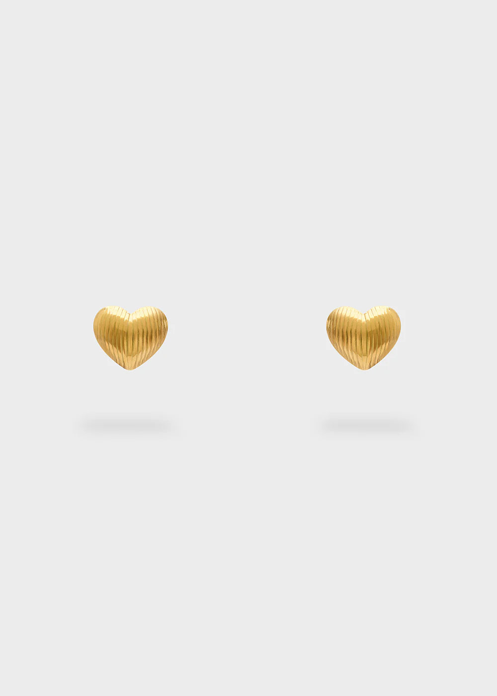Nali orecchini cuore zigrinati acc. ino.