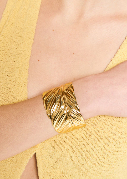 NALÍ - BRACCIALE RIGIDO LAVORATO ACC.INOS. ORO